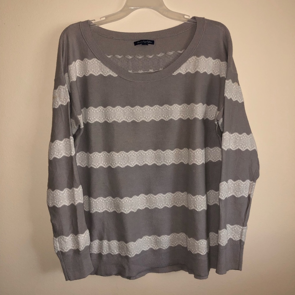 Grey sweater with lace stripes